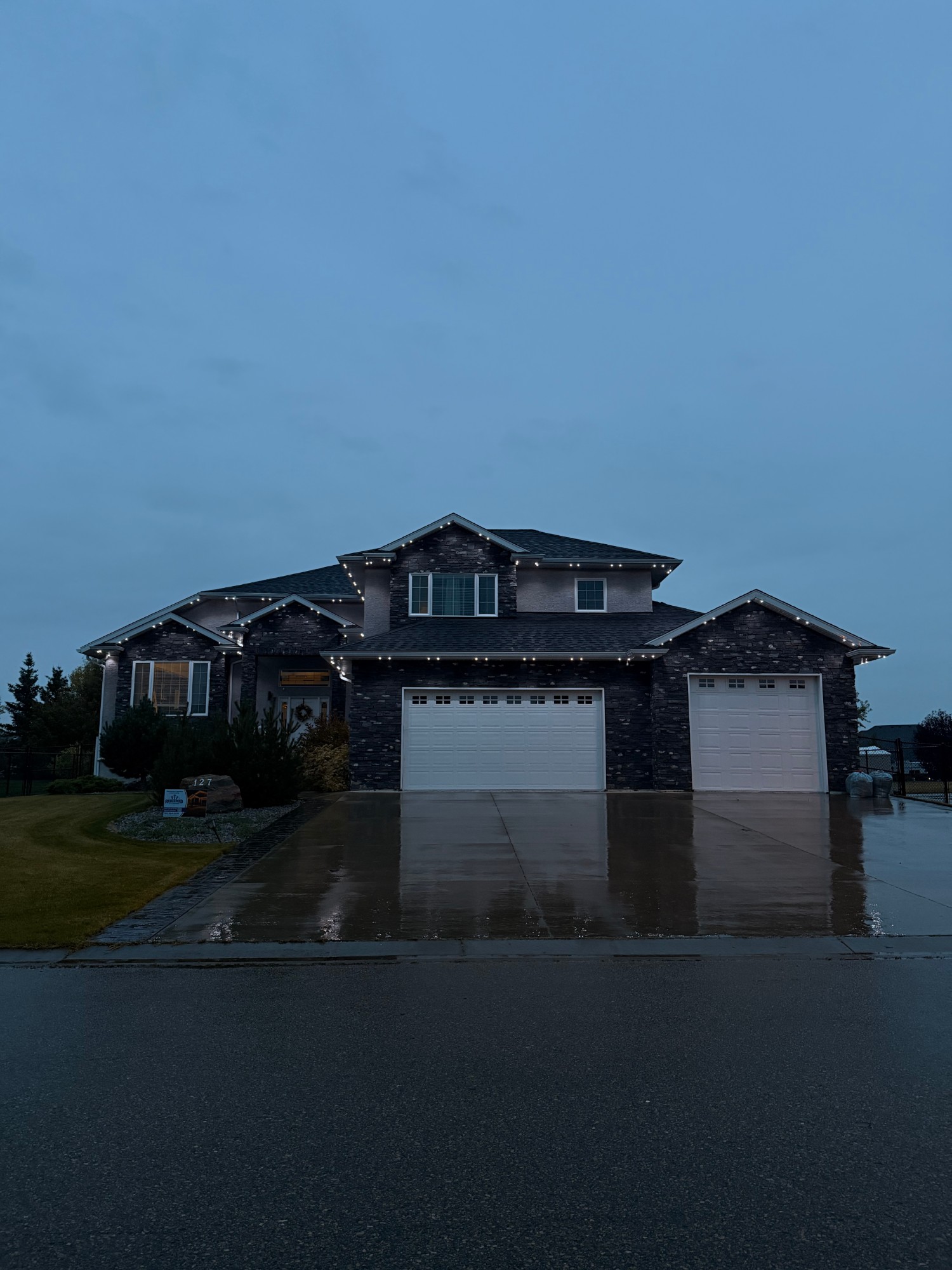 Aurum Lights permanent lighting install on a two-storey home